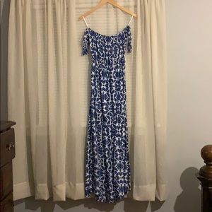 Blue and white off the shoulder dress.